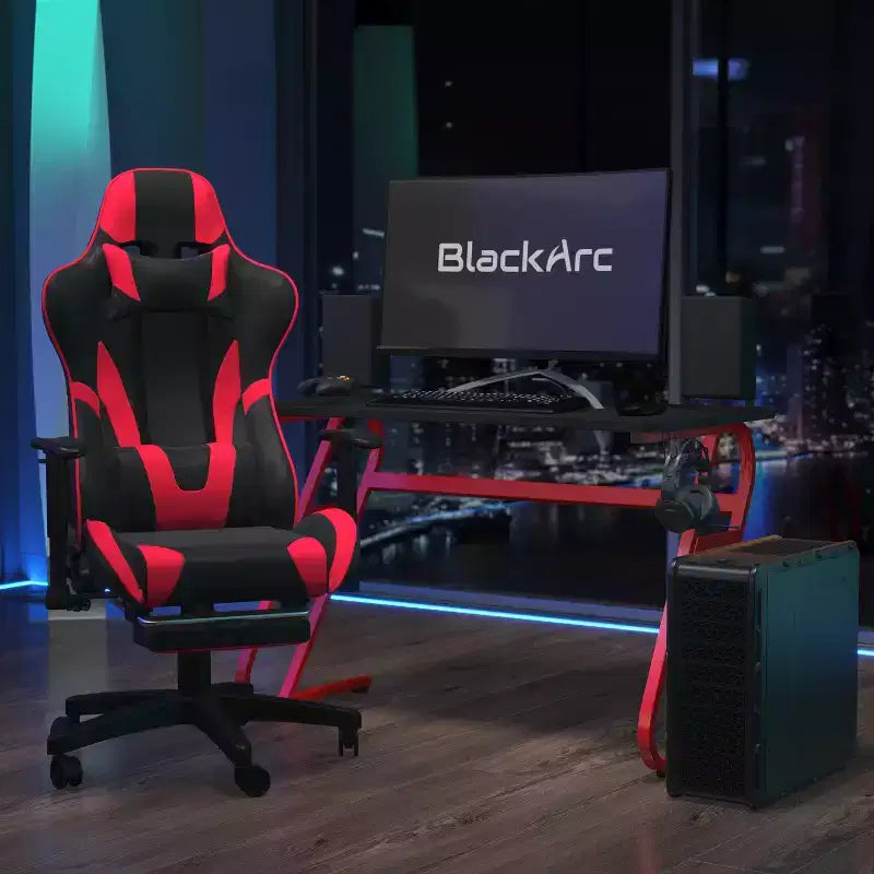 Set scrivania e sedia gaming BlackArc Echo: sedia gaming reclinabile in similpelle nera e rossa; scrivania gaming con gancio per cuffie e portabicchieri